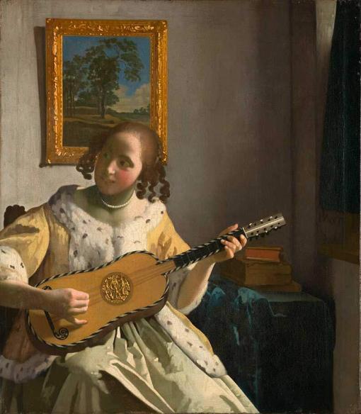 mujer tocando la guitarra de Vermeer
